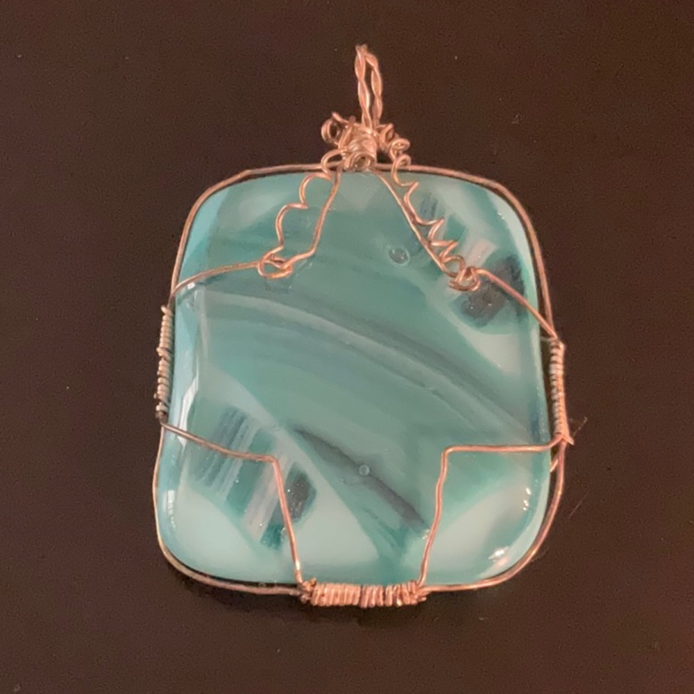 Chrysocolla in Quartz pendant wrapped in copper.